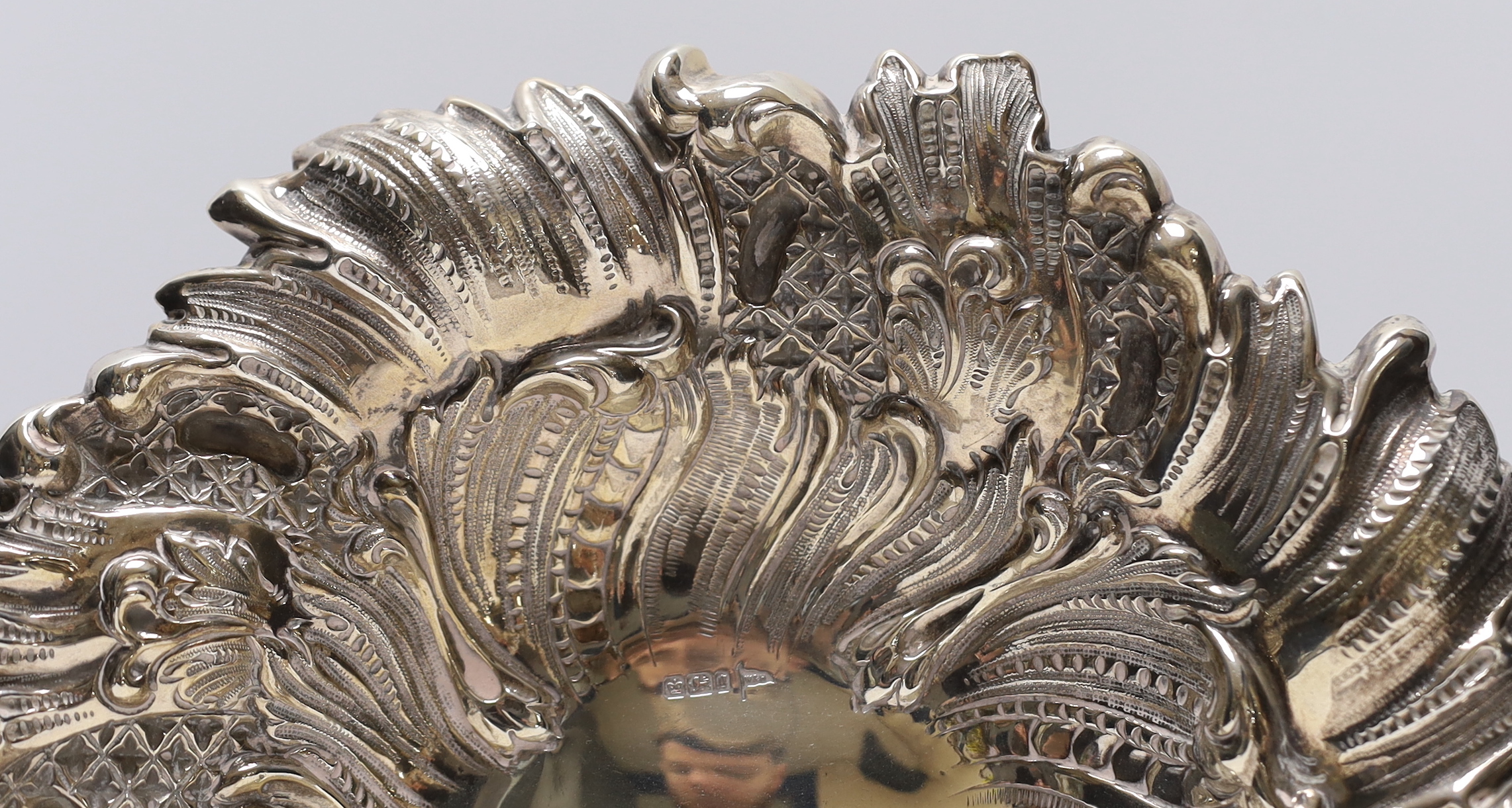 A late Victorian repousse silver bowl, by Walker & Hall, Sheffield, 1899, 26.2cm, 13.5oz.